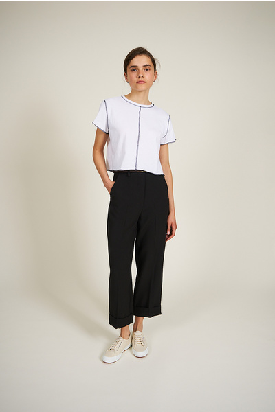 Trousers with turn-up hems